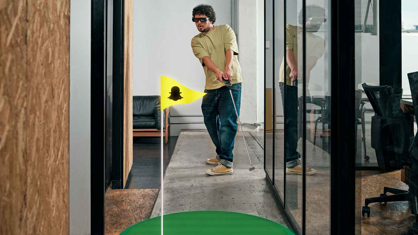 Image of person wearing Spectacles and playing Golf
